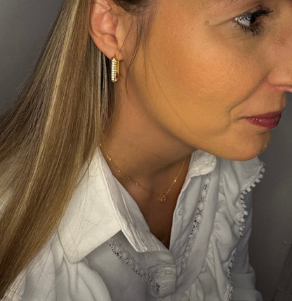 Boucle d’oreille Carène